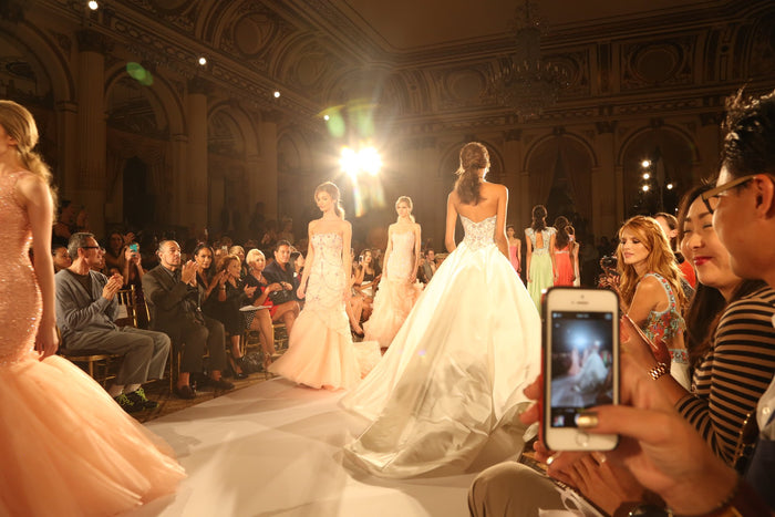 The finale seen from the front row, phones raised