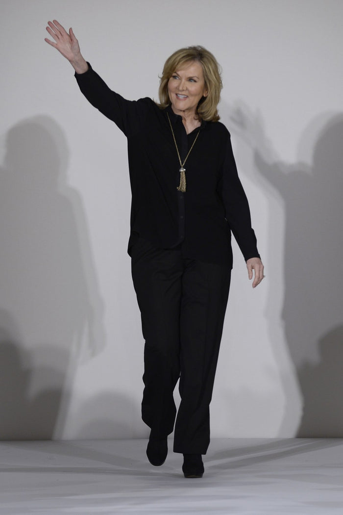 Sherri Hill walks the runway to close the show