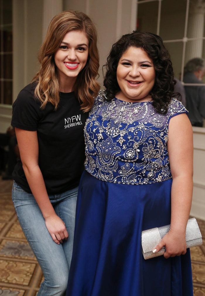 Two guests backstage before the show
