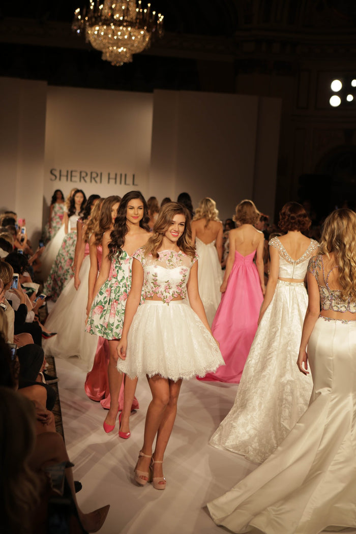 The finale lineup comes down the runway