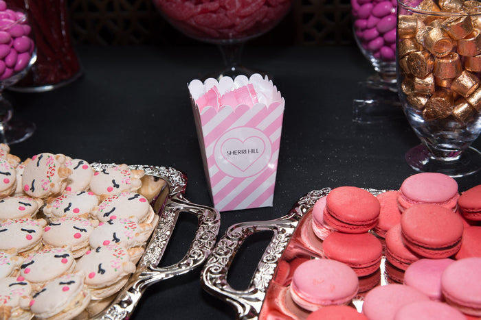 The sweets table backstage, macarons, popcorn and candy all in pink