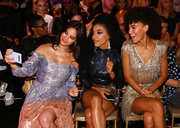 Guests take a selfie in the front row